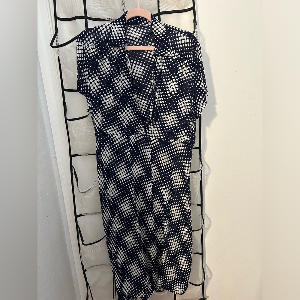 1930s dress light weight and fitted but not tight . Size 12